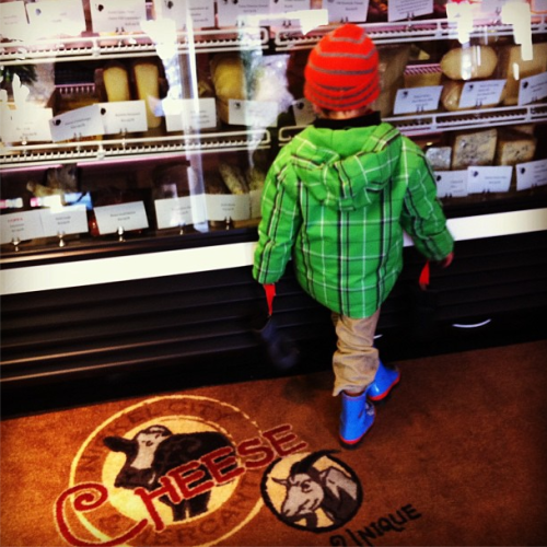 Felix picking cheese at Nickle City Cheese